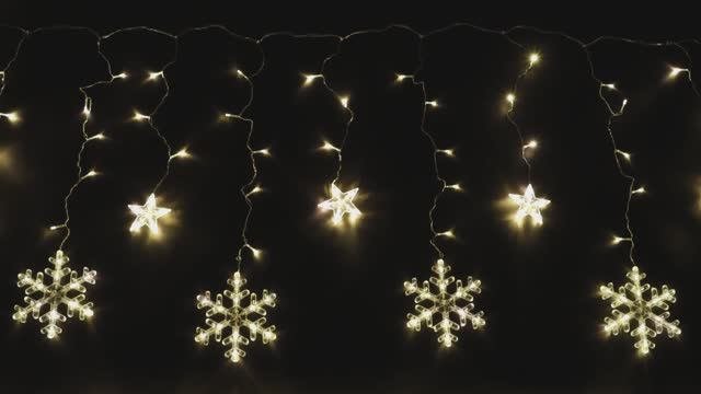 Электрогирлянда "Занавес со снежинками и звездами"