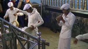 RELIGIOUS CEREMONY AT THE SUNRISE  ON THE TOP OF THE ADAM'S PEAK, SRI LANKA