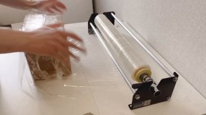 Диспенсер , держатель для стрейч пленки с системой натяжки