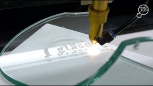 Лазерная гравировка на стекле omega glass