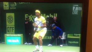 David Ferrer makes a hole in Doha tennis court