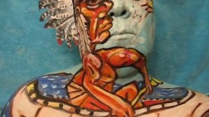 Native American Indian in a canoe! Face paint art in motion! Artist James Kuhn.