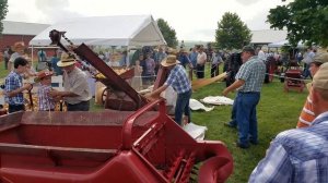 Shelling corn with a McCormick belt driven corn sheller