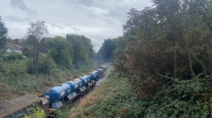 37716+37407 power past Hornbeam park for York