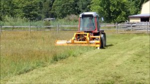 Antonio Carraro mowing with Ferri flail mower