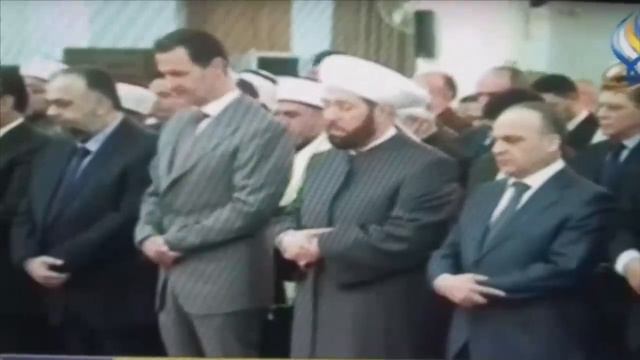 Syrian president Assad unable to stand still during prayers? смотреть онлайн