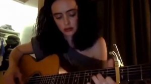 Kristen Ritter plays guitar