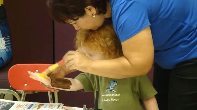 101210 Robert makes a painted handtree in preschool.MP4