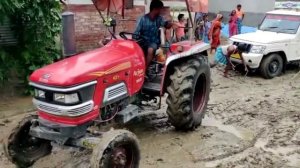 heavy loaded bolero offroading and tractor rescued bolero . assam goverment product in bolero.