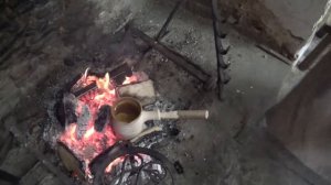 FRYING SALMON AT LLANCAIACH FAWR LIVING HISTORY MUSEU,