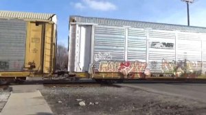 Norfolk Southern train a Emmons Boulevard in Wyandotte Michigan with a very special unit, trailing