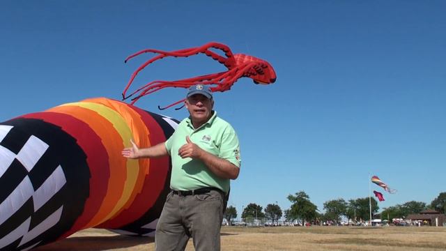 Scott Fisher from Gift of Wings is talking about the Don Jacobs Toyota Mots Kite Festival