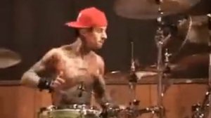 Travis Barker Playing Drums with One Arm