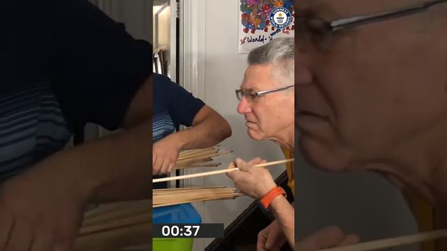 Guinness World Record for most arrows broken with the neck смотреть онлайн