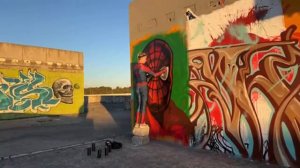 Spiderman draws graffiti