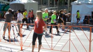 Beth at finish of Rock N Roll Half Marathon in Seattle.  Looks a lot different then at the start.