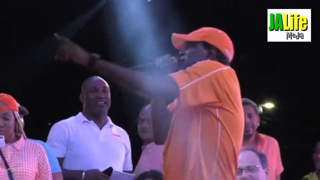 Veteran deejay PETER METRO performing at PNP meeting in Arnett Gardens
