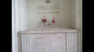 Kevin Grace visits the grave of Aaron Spelling