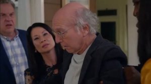 larry david and a glass door