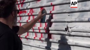 Artist paints message to migrants in Mexico