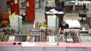 Автоматизация производства: маркировка упаковок тетрадей с помощью принтера-аппликатора Н-ПР-02