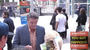 John Michael Higgins greets fans while arriving to ArcLight Theatre in Hollywood