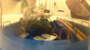 Проверка действующей модели рыбака в лодке