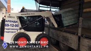 Разгрузка фуры мини-погрузчиком с палетными вилами