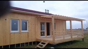 Обзор каркасного дома Сканди Выборг с вертикальной отделкой 0+