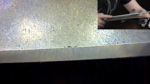 Заточка разрушенной кромки ножа Spyderco твердостью 68 HRC под микроскопом