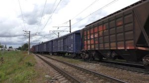 Тепловоз 2ТЭ116-1554 с грузовым поездом