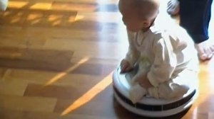 A 9 months korean baby drives her lovely car "the robot vacuum cleaner"