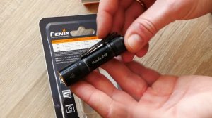 Обзор фонаря Fenix E12 v2.0 - компактный фонарь на АА