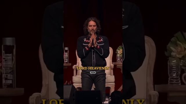 Russell Brand Prays Over Crowd