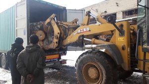 Погрузка контейнера лесом