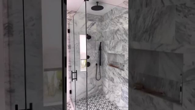 Shower Goals 😍A look into the Primary Bath featuring beautiful Marble Mosaic Floors & Walls!