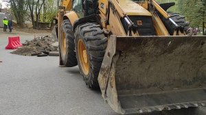 ул. Кржижановского. экскаватор