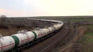 Тепловоз 2ТЭ116У-0165 с грузовым поездом