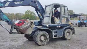 Тест-драйв колёсника Kobelco SK100W