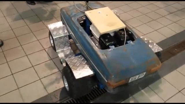 Педальный москвич с мотором.