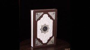 Коран на подставке