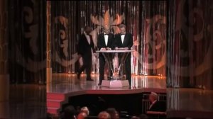 Sean Connery with Michael Caine and Roger Moore. Presenting Best Actor Oscar at 1989 Academy Awards