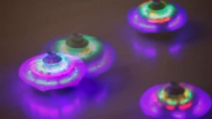 Light Up Spaceship Spinning Tops - HearthSong Toys
