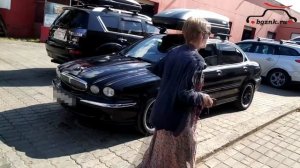 Jaguar X-Type с автобоксом Thule Pacific 780 на крыше