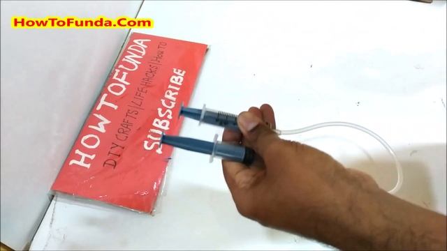 hydraulic lift (car) working model  | science project |  diy  | howtofunda