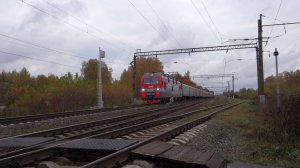 Электровоз ЭП1М-389 с пассажирским поездом проходит станцию Киселиха