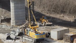 Буровая установка Bauer BG 25 на ремонте моста. Заливка буронабивных свай. Город Елец