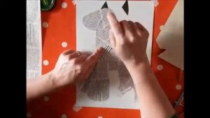 Собака. Аппликация из газетной и черной бумаги.  РЭР. Для детей 7-8 лет. Преподаватель Тулинова О.С.