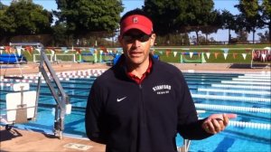 Greg Meehan women coach in Stanford talking to Ori Sela about swimming