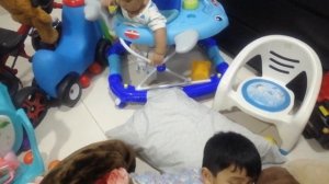 Muhammad Issa and Muhammad Ahmed are playing with their toys at home in Ajman